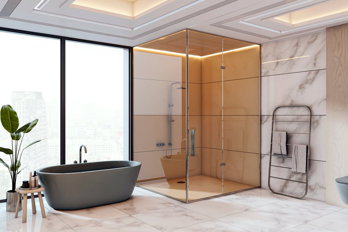 Baño moderno con mampara de vidrio templado